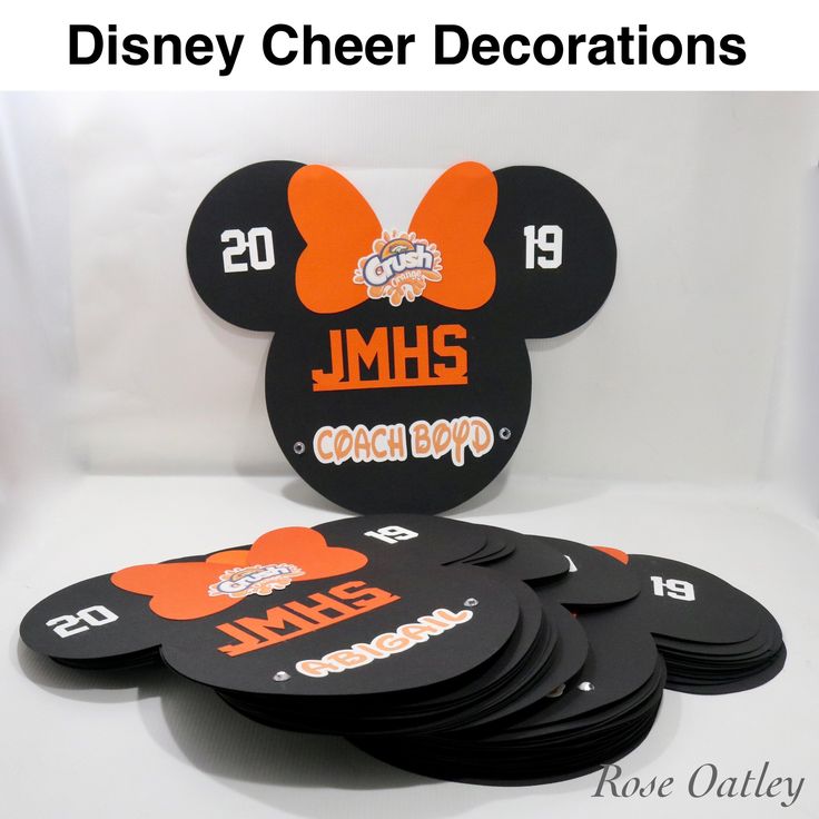 mickey mouse coasters are stacked on top of each other in front of a white background