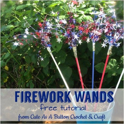 fireworks wands with red, white and blue stars on them are in a bucket