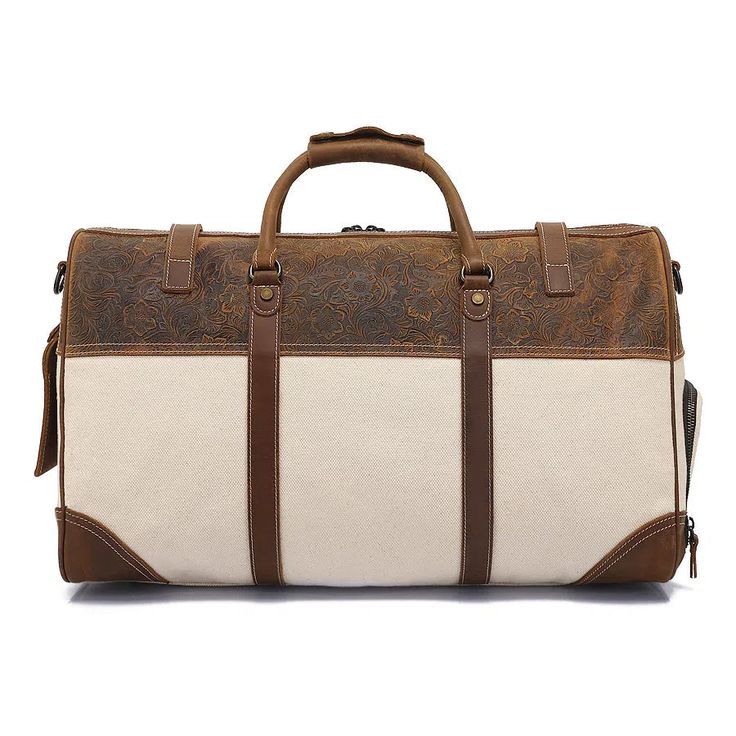 ITEM DETAILS   Material: Canvas 
color: off-white 
Size: L53*W25*H29 (CM) 
Weight: 1.7kg  ITEM OVERVIEW  Elevate your travel experience with the Cotton Canvas Duffle Bag with Shoe Compartment. Designed with the modern traveler in mind, this versatile bag features a dedicated shoe compartment, allowing you to neatly store and transport your footwear without worrying about soiling the rest of your belongings. The spacious main compartment offers ample storage, making it the perfect companion for 3-5 day business trips or weekend getaways. Crafted from durable cotton canvas and accented with premium leather handles, this duffle bag combines style and functionality for a seamless travel experience. Equipped with convenient pockets and a clear internal structure, you can easily organize and ac Luxury Coated Canvas Duffle Bag For Business, Luxury Beige Duffle Bag With Large Capacity, Luxury Beige Duffle Bag For Daily Use, Luxury White Tote Travel Bag, Luxury White Travel Bag For Daily Use, White Rectangular Travel Satchel, Classic Beige Weekender Bag For Travel, Luxury Brown Canvas Travel Bag, Luxury White Bags With Luggage Sleeve