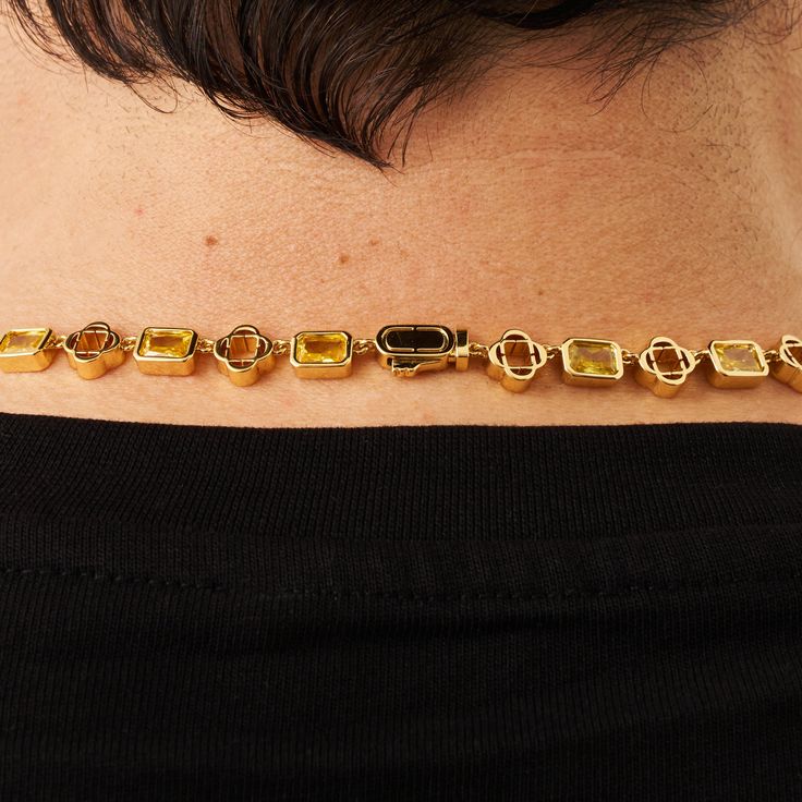 Renowned as a powerful source of abundance and positivity, the Yellow Citrine Necklace is CRAFTD with premium radiant cut gemstones and connected by 18K Gold Clovers. Encased within a secure bezel setting, the gems' beveled edges not only deepen their vibrant amber color but also enhance durability. Unique coupled links ensure a seamless neckline fit, while our classic CD clasp and scratch-proof plating present the hallmarks of a piece that’s truly #CRAFTDToLast. Length: 19.5"Stone Size: 6mm Inc Gold Jewelry With Rectangular Polished Stone, Gold Jewelry With Polished Finish And Rectangular Stone, Luxury Necklace With Rectangular Gemstone, Gold Diamond Jewelry With Rectangular Stone, Modern Citrine Gemstone Jewelry, Luxury Jewelry With Polished Finish And Rectangular Stone, Luxury Citrine Octagon Jewelry, Luxury Jewelry With Polished Rectangular Stone, Luxury Octagon Citrine Jewelry