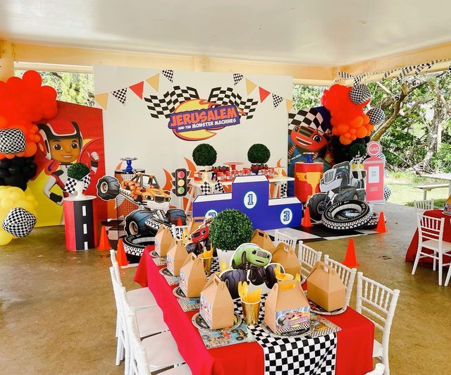 a table set up for a race car themed birthday party