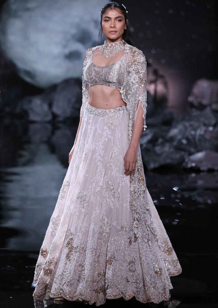 Dusty ivory chikankari lehenga interspersed with pearl and zardosi hand embroidery. Paired with sheeted crystal choli and heavily embroidered cutwork shimmer tulle dupatta. Floral Bridal Lehenga, Dolly J, Ivory Lehenga, Chiffon Embroidery, Chikankari Lehenga, Makeup Images, Zardozi Embroidery, Glamour Dress, Western Wedding