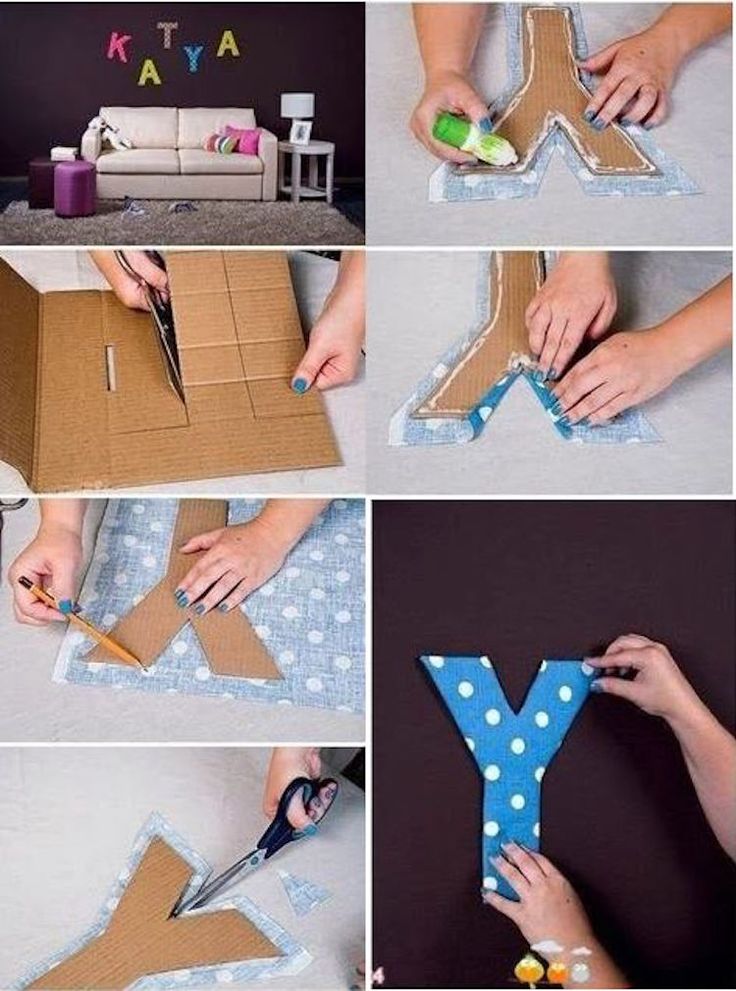 someone is making a letter out of cardboard