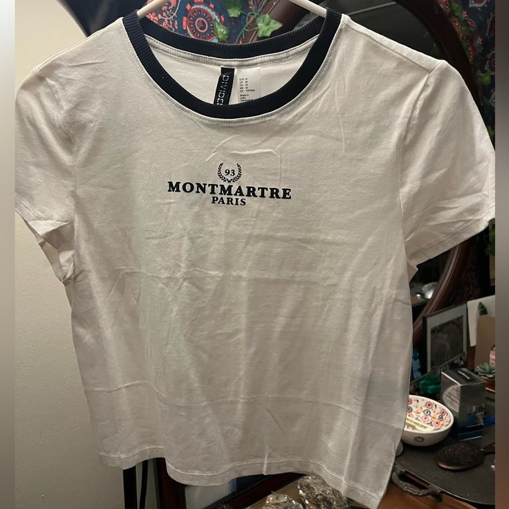 Completely New, Never Worn. Very Cute And Downtown Girl Style H&m Graphic Print Tops For Spring, H&m Casual White T-shirt, White H&m T-shirt Crew Neck, H&m White Cotton T-shirt, H&m Summer Shirt For Everyday Wear, H&m White Graphic Print T-shirt, H&m White Crew Neck T-shirt, H&m White Graphic Print Tops, H&m White Cotton Shirt