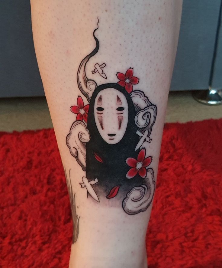 a person with a tattoo on their leg