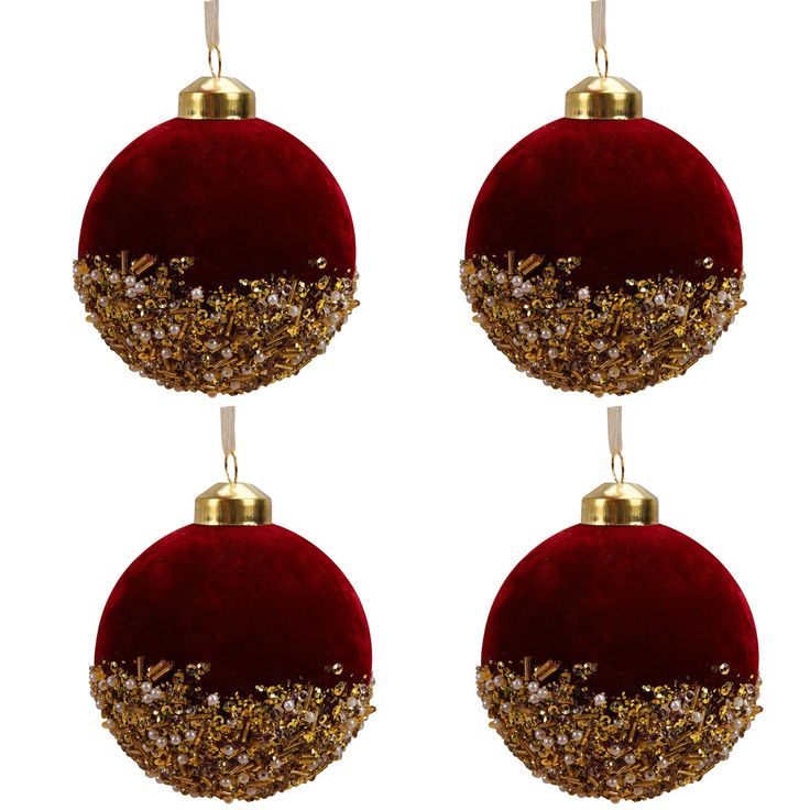 three red and gold christmas ornaments hanging from the top of each ornament on a white background