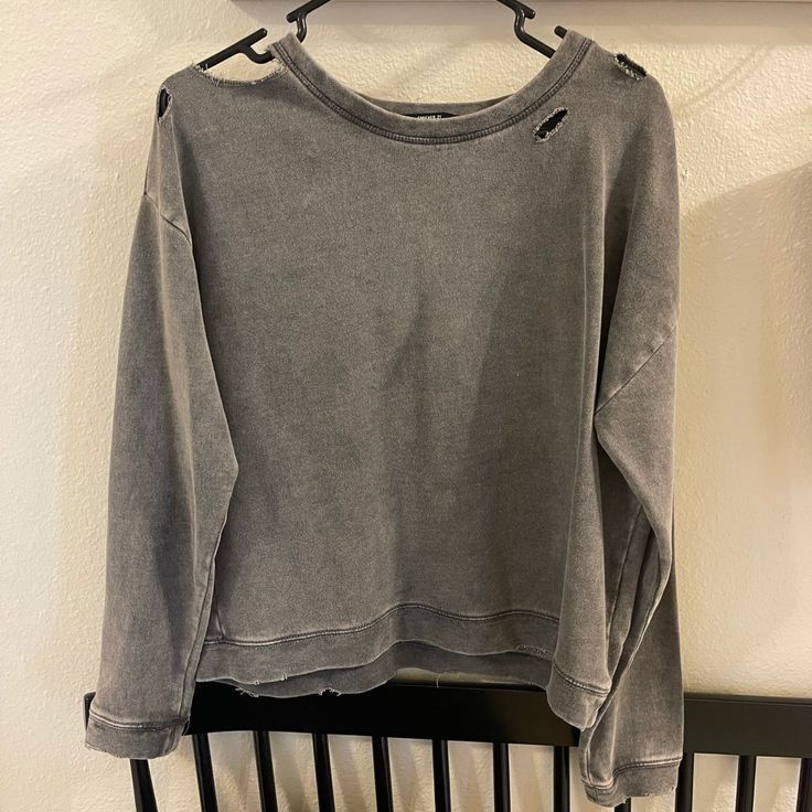 Nwot Long-Sleeve Sweatshirt With Holes In Excellent Condition. Was Made With The Holes. Color Is More Like A Dark Or Charcoal Grey Long Sleeve Grunge Tops For Spring, Grunge Tops For Everyday Spring Wear, Everyday Grunge Tops For Spring, Grunge Spring Tops For Everyday, Spring Everyday Grunge Tops, Spring Grunge Everyday Tops, Casual Distressed Crew Neck Sweater, Forever 21 Crew Neck Tops, Forever 21 Trendy Relaxed Fit Tops