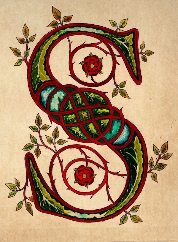 the letter s is made up of leaves and vines, with an intricate design on it