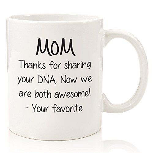 a white coffee mug with the words mom on it and an image of a child's face