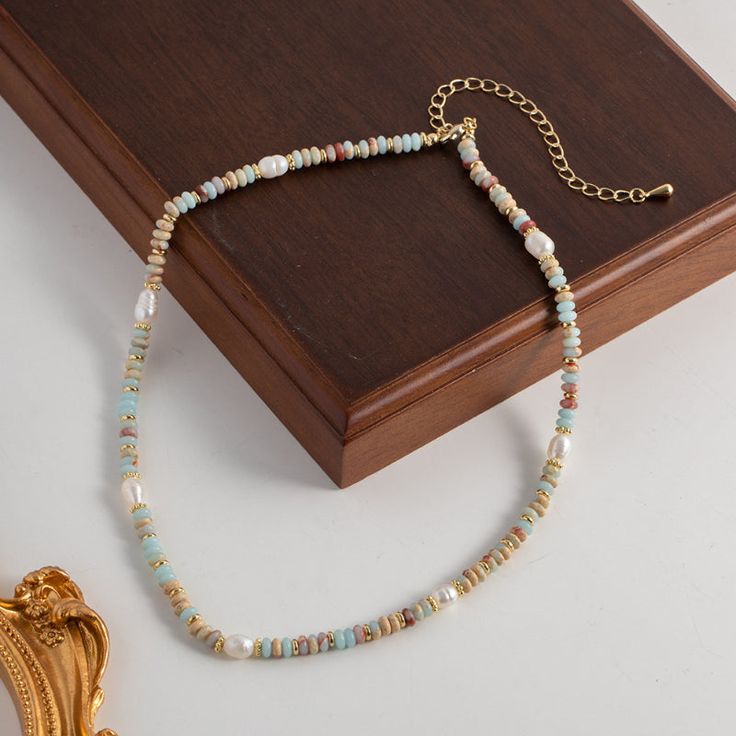 Freshwater Baroque Pearl & Natural Shoushan Stone This unique necklace combines the natural beauty of colorful Shoushan stone and baroque pearls, evoking a sense of artistic nostalgia and the carefree spirit of seaside holidays. Crafted with attention to detail, this necklace exudes a bohemian vintage charm. The co Unique Pearl Necklace, Shoushan Stone, Sentimental Gifts For Mom, Pearl Accessories, Freshwater Pearl Necklace, Unique Necklace, Premium Gift, Natural Elements, Elegant Necklaces