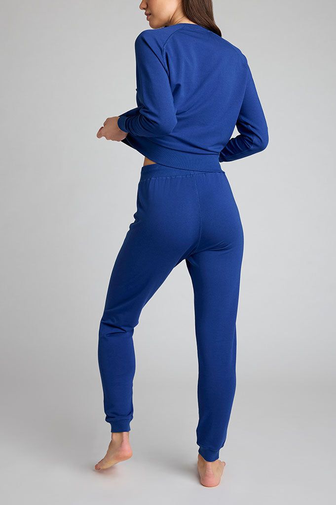 [Ksenia XS] Comfy Stretch Sweats For Loungewear, Cozy Fit Activewear With Ribbed Waistband For Loungewear, Solid Color Sweats For Loungewear, Athleisure Style, Cozy Fit Sweatpants With Ribbed Cuffs For Loungewear, Solid Color Athleisure Sweats For Loungewear, Blue Joggers For Fall Loungewear, Blue Tracksuit With Ribbed Cuffs For Loungewear, Fitted Sportswear Tracksuit For Loungewear, Athleisure Joggers With Elastic Cuffs For Lounging