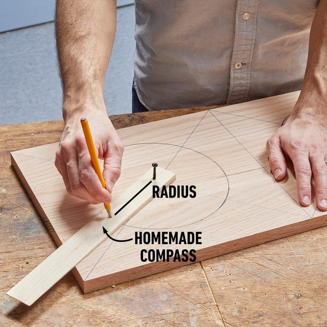 a man is working on a piece of wood with the words radus and homemade compasss