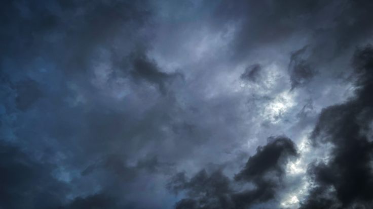 the sky is filled with dark clouds as it appears to be overcast and cloudy