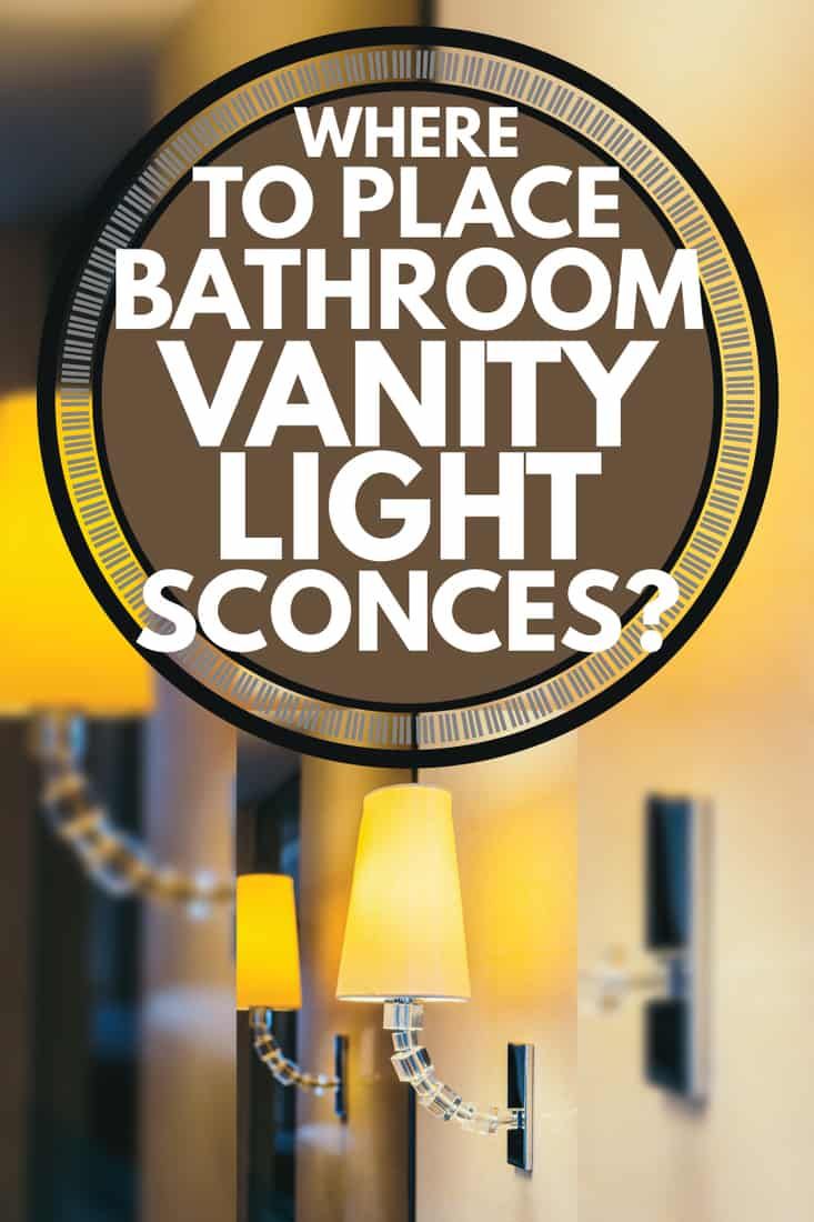 there is a sign that says where to place bathroom vanity light sconces?