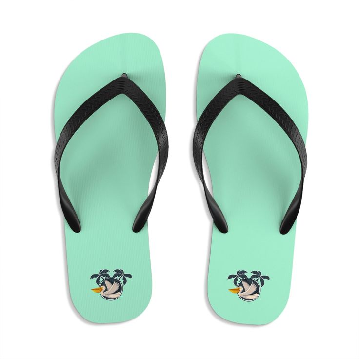 Let your feet breathe! With a high quality print, these Flip Flops are a must-have item on the beach, around the house or to brighten up a special outfit on hot summer days. .: 100% Rubber sole .: 100% Polyester jersey sole cover .: Multiple sizes .: Textured black thong strap .: Runs bigger than usual Green Casual Flip Flops For Vacation, Casual Green Flip Flops For Vacation, Green Casual Flip Flops For Beach Season, Casual Green Flip Flops For Beach Season, Sporty Flip Flops For Summer Vacation, Sporty Summer Flip Flops For Vacation, Sporty Summer Vacation Flip Flops, Green Graphic Print Swimwear For Summer, Comfortable Flip Flops For Pool And Beach Season