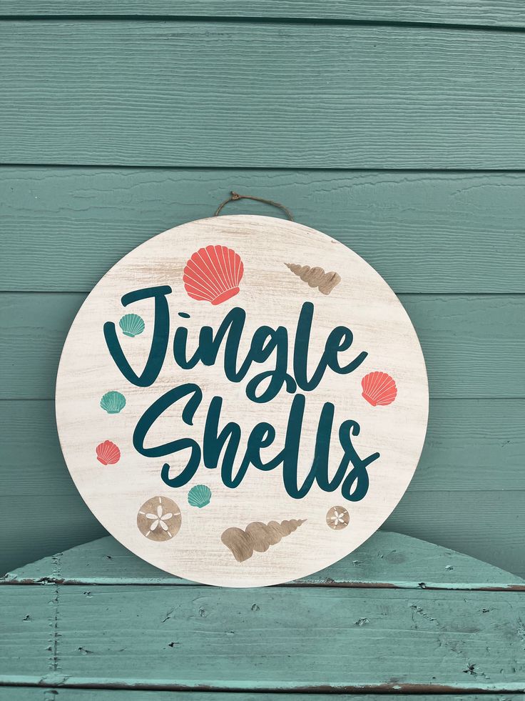 a wooden sign that says jungle shells on the side of a green wood plank wall