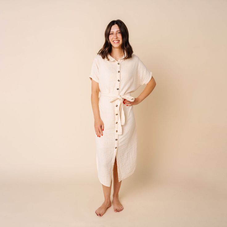 Your all-in-one dress for every mama, every season. I designed this dress with every woman in mind to be easy, comfortable and beautiful during all the phases of motherhood and beyond. It will carry you comfortably through the final stretch of pregnancy when nothing else fits. It will be your go-to dress, and the easiest outfit for breastfeeding and feeling like yourself--in your fourth trimester...and always. It’s the dress that feels like we are all in this together. Wear, love, wash, repeat. Relaxed Fit Midi Length Sundress, Cream Midi Length Dresses For Day Out, Cream Knee-length Dress For Daywear, Casual Cream Dress For Dress Down Occasions, Mid-length Linen Dress For Day Out, Beige Mid-length Dress For Day Out, Cream Midi Dress For Summer In Modest Style, Modest Cream Midi Dress For Summer, Relaxed Fit Mid-length Daywear Dresses