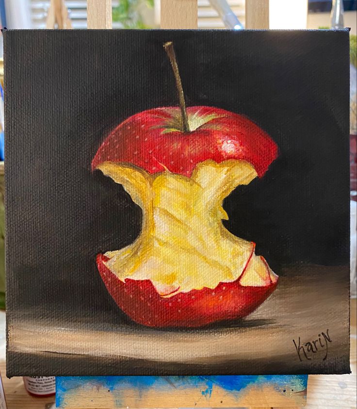 an apple painted with acrylic paint on a canvas