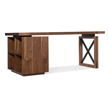 a wooden desk with an x design on the top and two open shelves below it