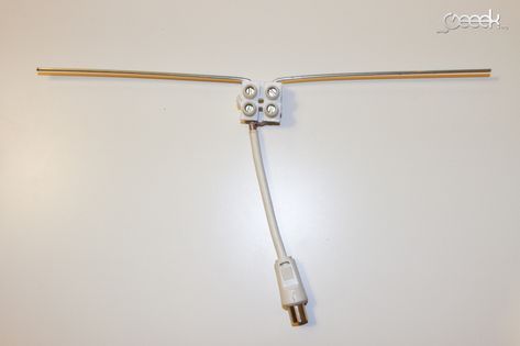 an image of a cable attached to a wall with two plugs on each end