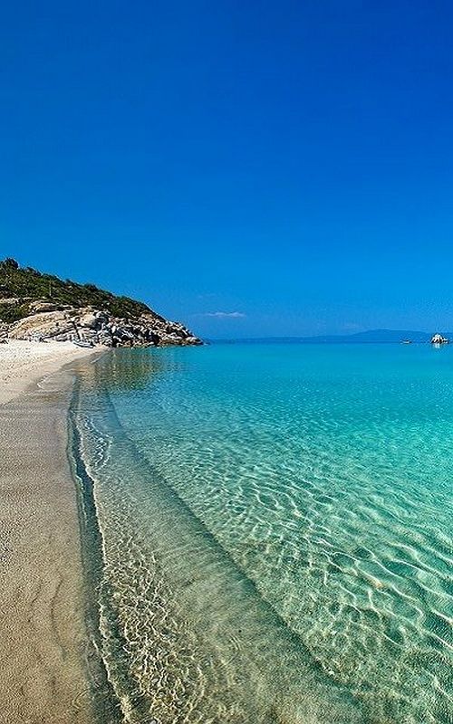 the water is crystal blue and clear at this beach