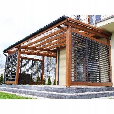 an outdoor covered patio with wooden slats and metal bars on the sides, in front of a house