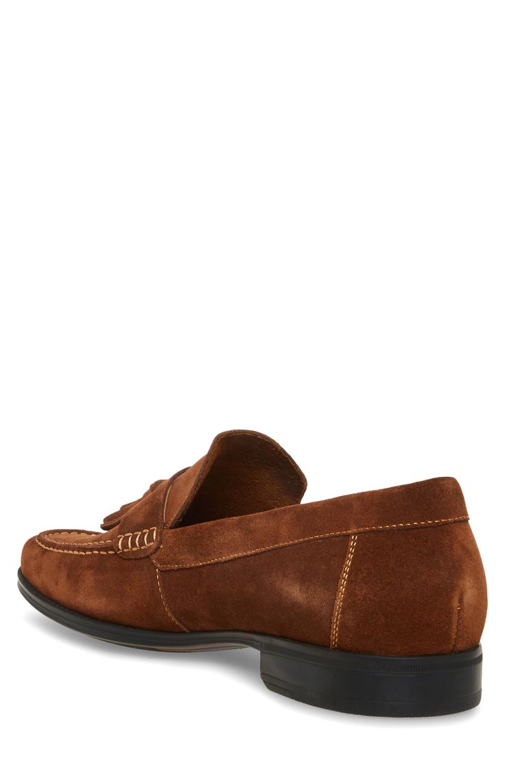 Swingy tassels accent the vamp of this smooth suede loafer that'll bring a timeless, yet stylish approach to your look. Leather upper/synthetic lining/rubber sole Imported Casual Suede Tassel Loafers, Brown Suede Moccasins With Tassels, Suede Tassel Slip-on Moccasins, Suede Tassel Loafers For Work, Brown Suede Slip-on Tassel Loafers, Fall Suede Slip-on Tassel Loafers, Brown Suede Tassel Loafers With Rubber Sole, Brown Suede Tassel Loafers For Work, Fall Suede Tassel Loafers