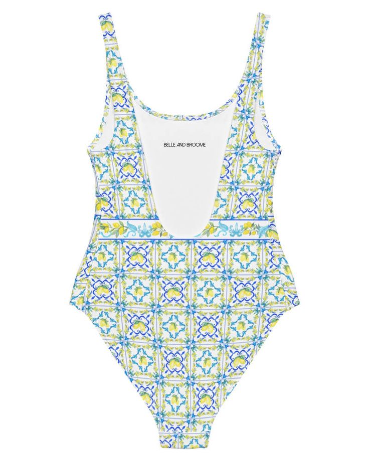 Make a splash in this plus-size one-piece from our size-inclusive swimwear collection. Patterned Floral Print Swimwear For Poolside, Patterned Swimwear For Poolside, Patterned Beachwear Swimwear For Pool, Fitted Patterned Swimwear For Poolside, Lemon Print Swimwear For Beachwear, Summer Lemon Print Swimwear For Pool, Fitted Lemon Print Swimwear For Beach, Fitted Lemon Print Swimwear For Vacation, Summer Swimwear With Lemon Print For Pool