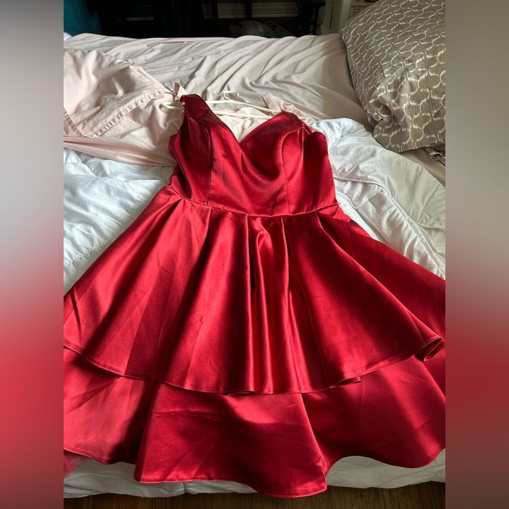 Hoco Dress Red Never Worn Not Sure Of Size Maybe 10-12 Red Sleeveless Mini Dress For Homecoming, Red Homecoming Dress With Sweetheart Neckline, Red Sweetheart Neckline Dress For Homecoming, Chic Red Mini Dress For Homecoming, Red Mini Length Homecoming Dress, Red Spring Dresses For Homecoming, Red Dresses For Spring Homecoming, Red A-line Lined Dress, Holiday Red A-line Mini Dress