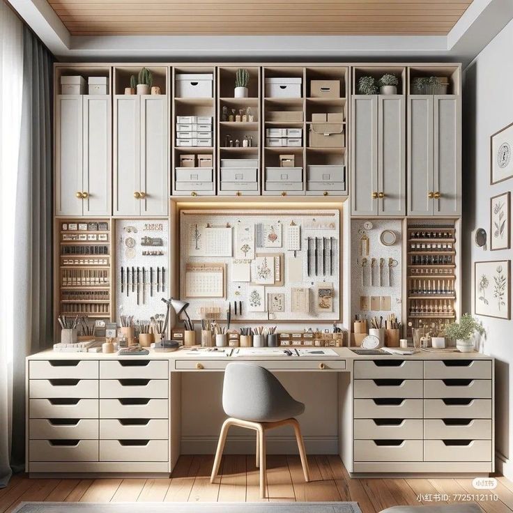 an organized work space with lots of drawers and cabinets in the wall, along with a chair