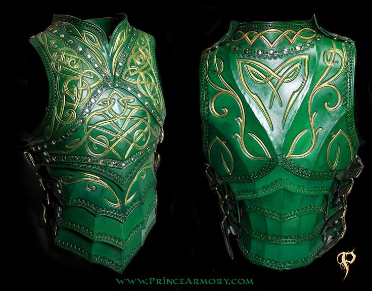 two green leather masks with intricate designs on the front and back, side by side