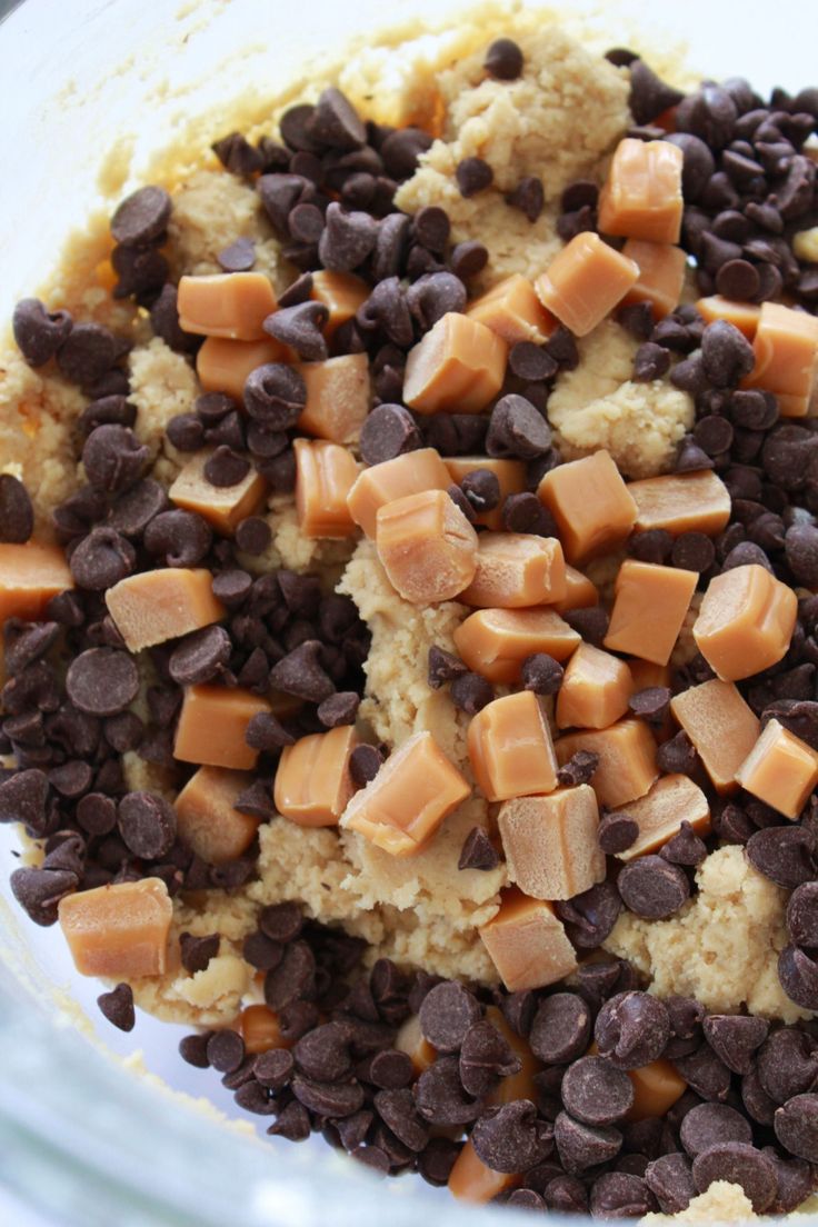 a bowl filled with chocolate chips and oatmeal