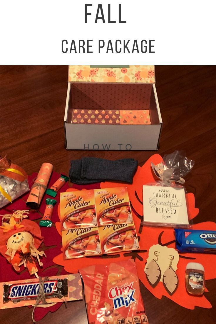 an assortment of snacks and candy on a table with text overlay that says fall care package