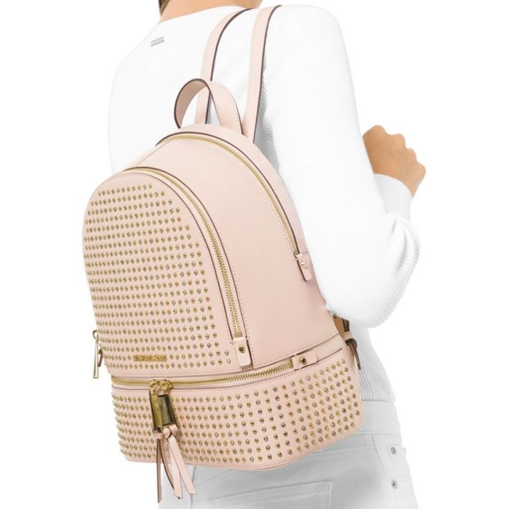 Beautiful Michael Kors Steal The Show In Chic,Studded-Leather Style With This Michael Kors Rhea Backpack Ready To Sharpen Your Look With Adjustable Straps And Polished Hardware 100% Authentic Brand New With Tags Luxury Pink Leather Backpack For Daily Use, Pink Leather Backpack With Detachable Strap, Pink Leather Backpack For Errands, Designer Pink Standard Backpack, Luxury Pink Backpack, Luxury Pink Standard Backpack, Designer Pink Leather Backpack, Pink Leather Backpack With Removable Pouch, Pink Michael Kors Backpack For Travel