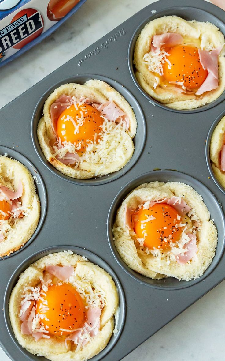 an image of eggs in the middle of muffins