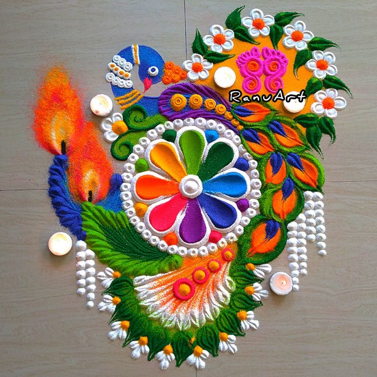 an artistic design on the floor for diwaling with colorful flowers and fish in it