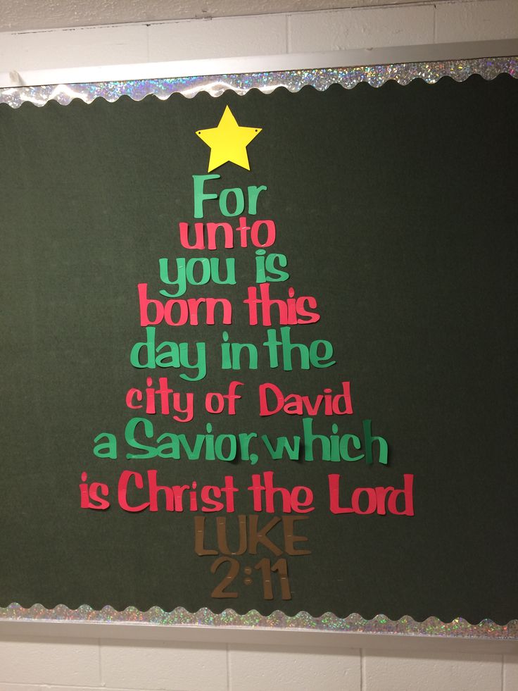 a christmas tree made out of paper with the words for unto you're born this day in the city of david