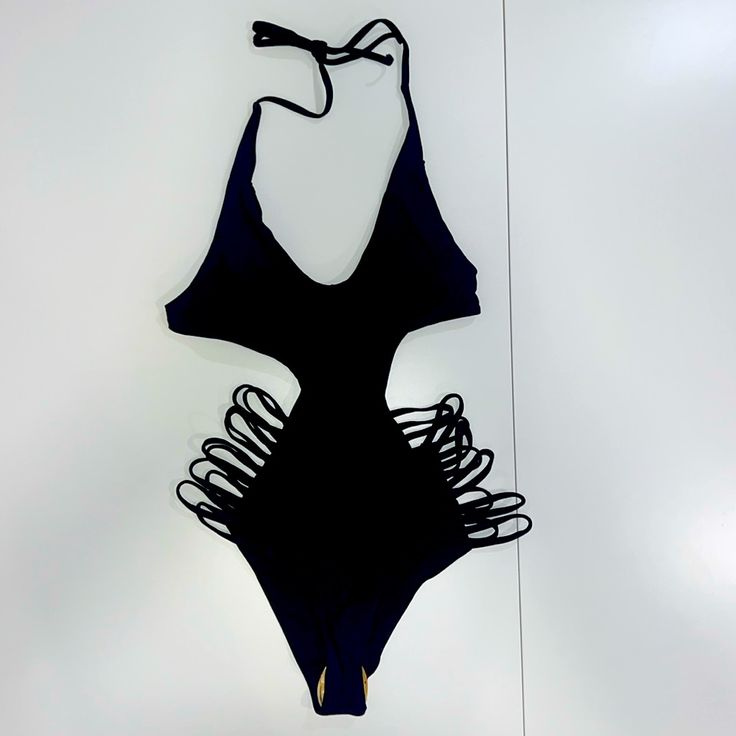 Nwot Matte Collection Black Halter Tie On One Piece Sexy Bathing Suit Never Worn, Still Has Hygienic Liner Size: Small Materials: 82% Nylon 18% Spandex Black Cutout Halter Neck Swimwear, Black Halter Neck Cutout Swimwear, Black Triangle Top Swimwear With Cutout, Black Cutout Triangle Top Swimwear, Black Cutout Backless Swimwear, Black Backless Cutout Swimwear, Black Stretch Cutout Swimwear, Black Stretch Strappy Bodysuit, Black Hollow Out Swimwear For The Beach