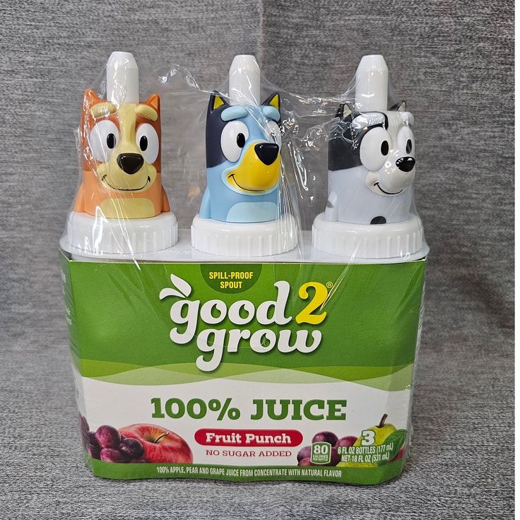 three bottles of juice with cartoon animals on them