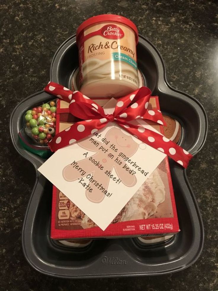 a container with some food in it and a red ribbon around the lid that is tied up