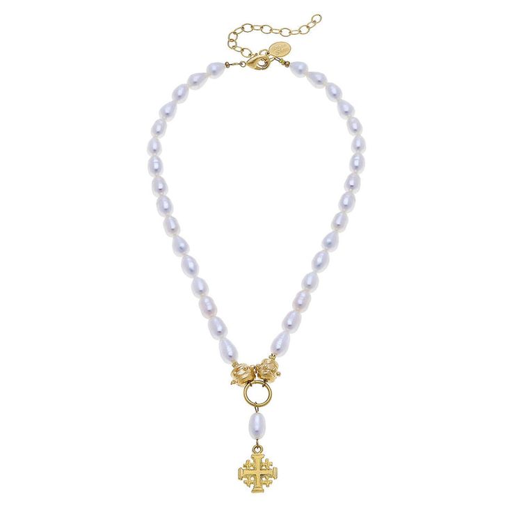 The Jerusalem Cross is an ancient Christian symbol that represents the 5 wounds of Christ, Christ and the 4 corners of the world, and Christ and the 4 evangelists, Matthew, Mark, Luke and John. In this piece, a dainty pendant is offered on a freshwater pearl strand. 16 inches with a 3 inch extender chain Available Trip Cross Pendant Necklace With Pearl Charm, Spiritual Pearl Drop Cross Jewelry, Spiritual Cross-shaped Pearl Chain Jewelry, Spiritual Cross Jewelry With Pearl Drop, Elegant Pearl Drop Cross Pendant Necklace, Elegant Cross Pendant Necklace With Pearl Drop, Pearl Drop Cross Pendant Necklace For Gift, Pearl Necklace With Cross-shaped Pearl Pendant, Spiritual Medallion Necklace With Pearl Pendant