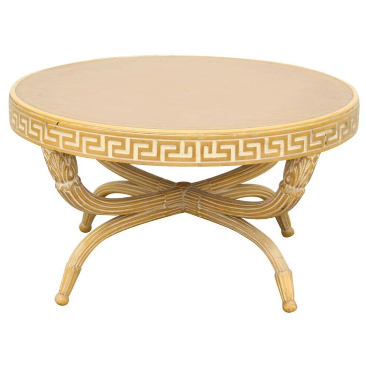 a round table with an intricate design on the top