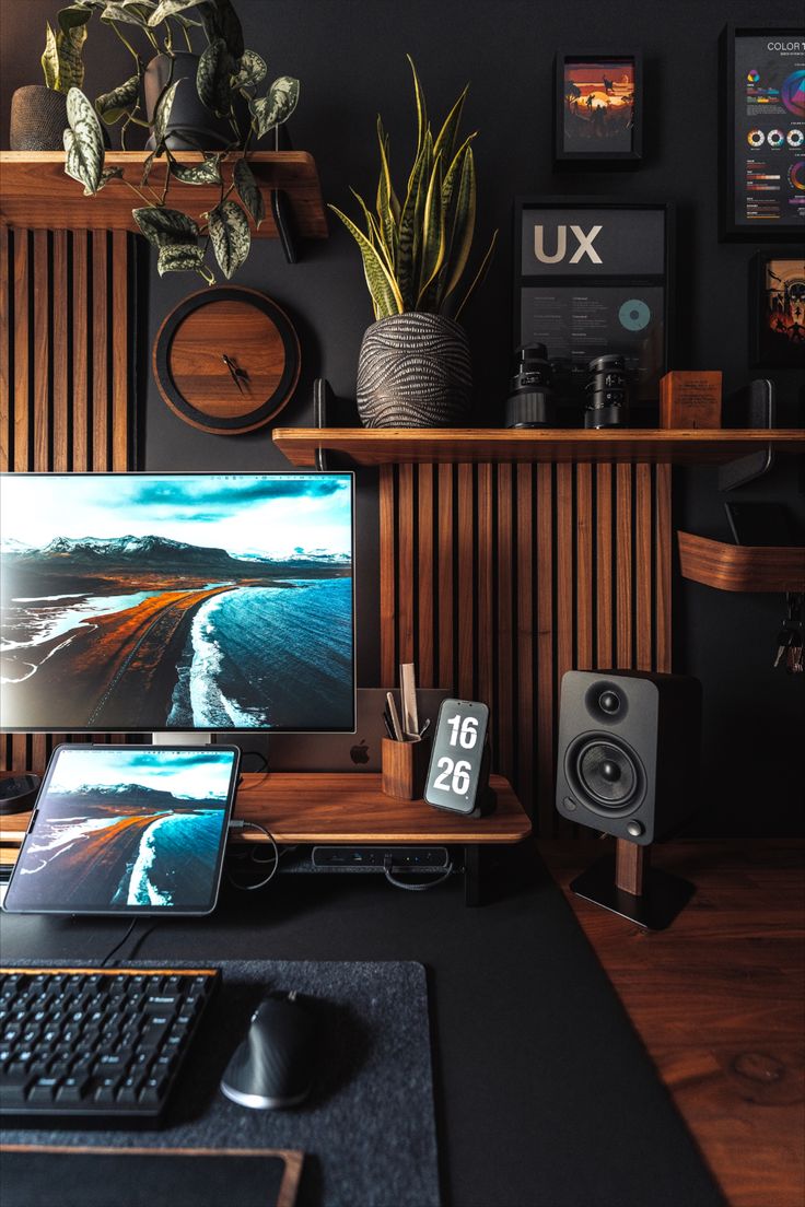 a desktop computer sitting on top of a wooden desk