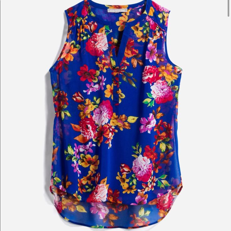 Stunning Floral Printed Lightweight Sleeveless Blouse With An Attached Blue Liner Tank And A Curved High-Low Hem. Made Of 100% Polyester Hand Wash Chic Multicolor Floral Print Tank Top, Casual Sleeveless Blue Blouse, Blue Sleeveless Floral Print Top, Blue Floral Print Sleeveless Top, Multicolor Sleeveless Casual Blouse, Multicolor Sleeveless Blouse With Floral Print, Blue Floral Print Tank Top, Casual Sleeveless Multicolor Blouse, Casual Multicolor Sleeveless Blouse