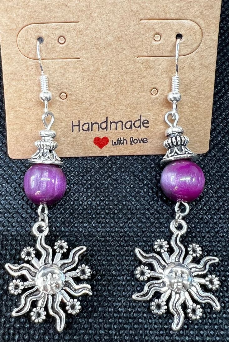 Silver sunburst dangling with silver and purple bead earrings Purple Beaded, Jewelry Making Earrings, Snowflake Earrings, Handmade Beaded Jewelry, Pearl Earrings Dangle, Beaded Dangle Earrings, Etsy Earrings Dangle, Bead Earrings, Beaded Dangles