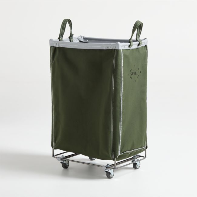 a green shopping cart with wheels and a bag on the top that is attached to it