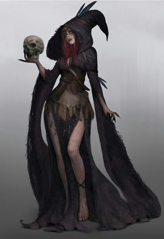 a woman dressed in black holding a skull and wearing a long dress with feathers on it