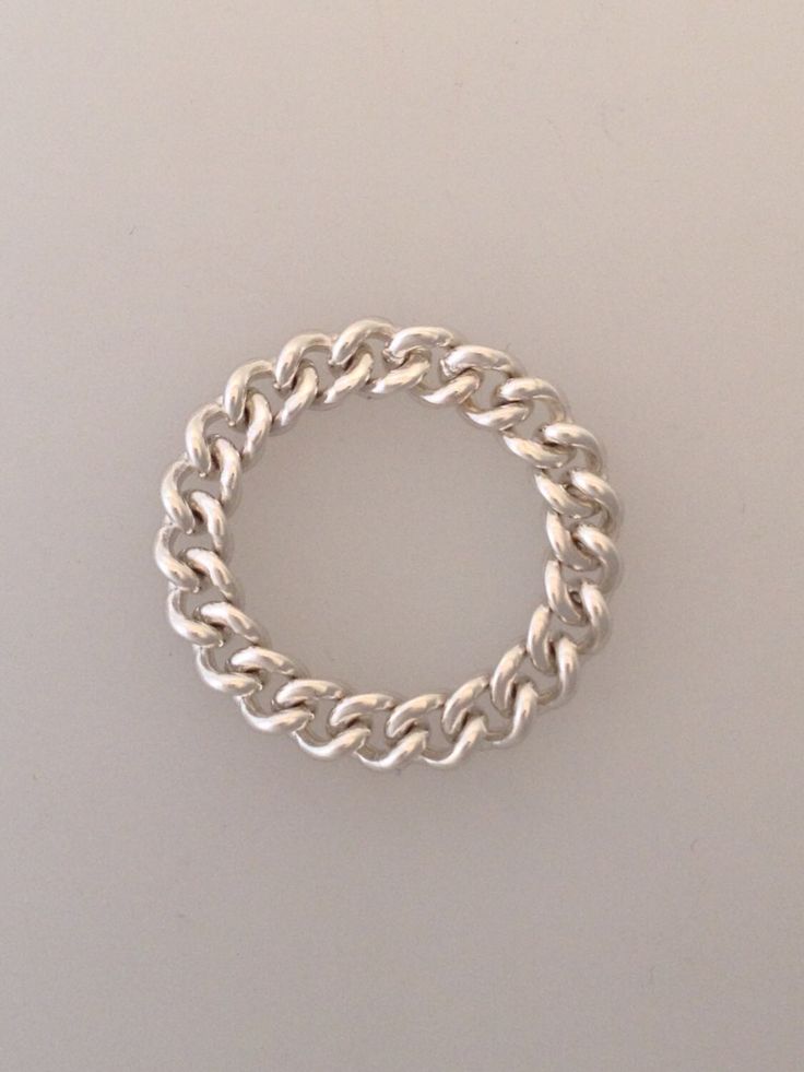 Beautifully simple curb chain ring in sterling silver which slides easily on & off your finger.  Wear it as a single, or stacked with others!  This silver chain ring looks and feels better the more it's worn.  * If you'd like the ring oxidised, just mention it when ordering!  For more rings take a look: www.etsy.com/uk/shop/LapisAndCoral?section_id=16611775&ref=shopsection_leftnav_1 width approx: 4mm height approx: 3mm This item is made to order, so please allow up to 10 working days for delivery. You can view more beautiful jewellery here: LapisAndCoral.etsy.com Ring sizes: The best way to find out your ring size is to simply pop into your local jeweller and have them professionally size it. The alternative is to search: 'ring sizes', and print out a chart for reference. Silver Chain Ring, Gold Texture, Chain Ring, Curb Chain, Stackable Rings, Uk Shop, Pearl White, Silver Chain, Beautiful Jewelry