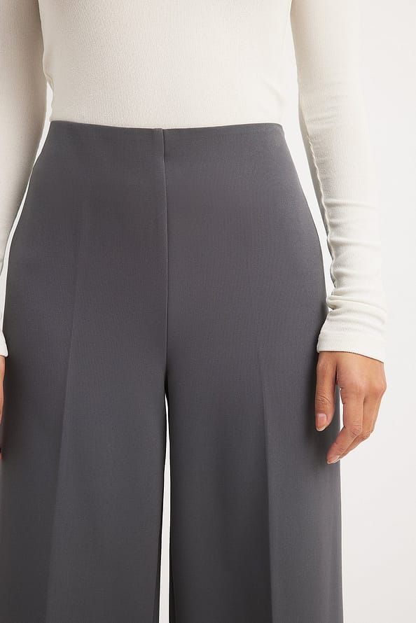 Culotte High Waist Pants Grey | NA-KD Chic Stretch Gray Wide Leg Pants, Chic Gray Stretch Wide Leg Pants, Gray Workwear Bottoms With Elastic Waistband, Stretch Gray Wide Leg Pants For Fall, Gray Stretch Wide Leg Pants For Fall, Chic Gray Wide Leg Pants For Work, Elegant Gray Wide Leg Bottoms, Elegant Wide Leg Gray Bottoms, Gray Wide Leg Workwear Pants For Fall