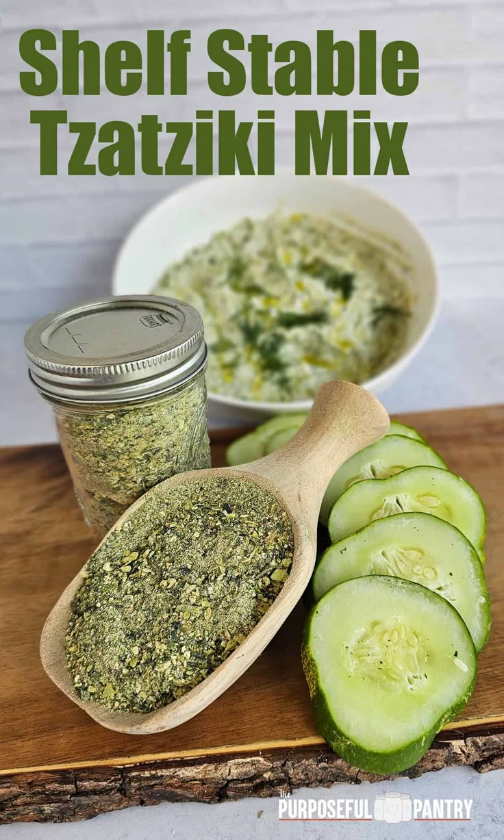 a wooden cutting board topped with cucumber slices next to a jar of feta cheese